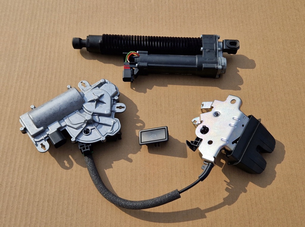 фото №1, Замок доводчик кришки циліндр passat b8 sedan комплект