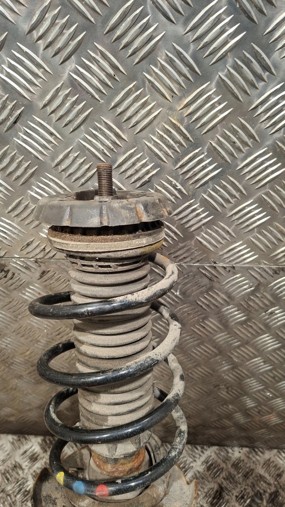 Амортизатор поворотный кулак левый перед peugeot 301 1.6hdi Недорого