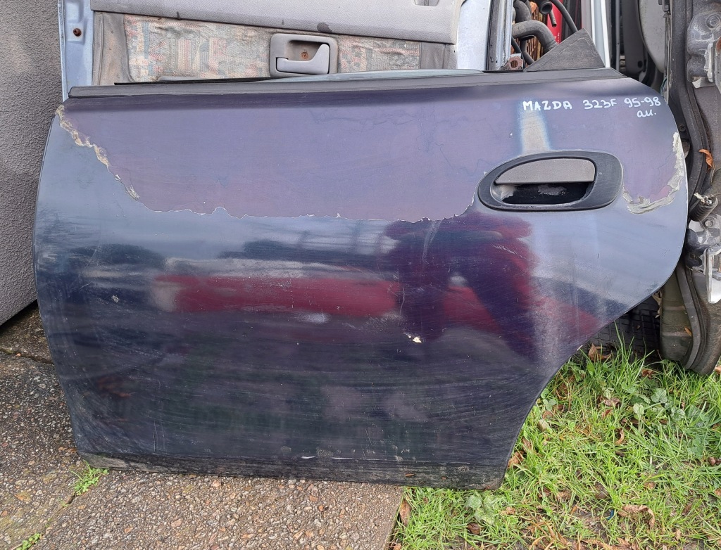 Купить Mazda 323f 95 - 98 дверь левое  задняя