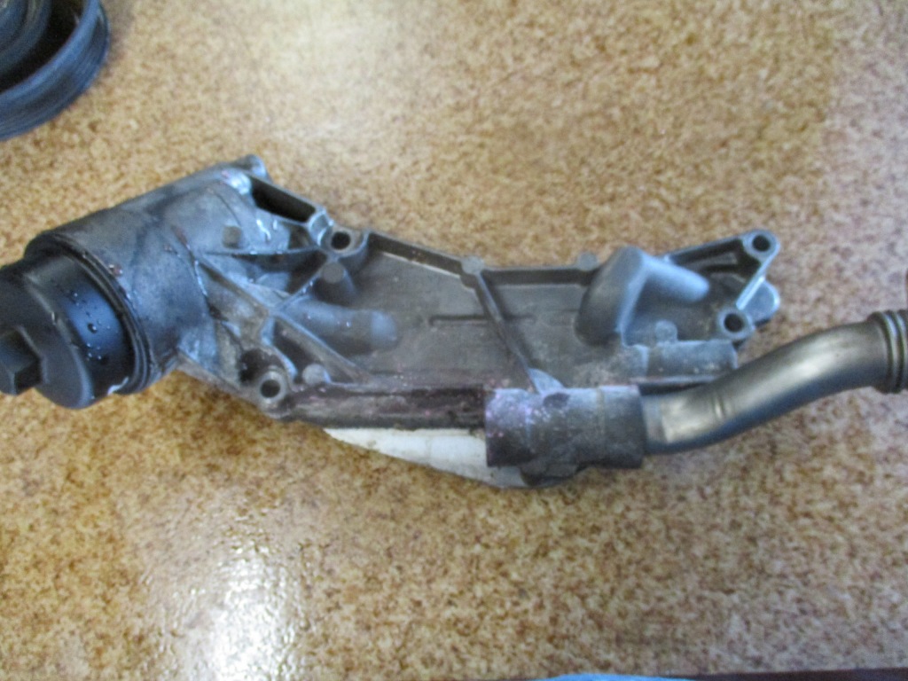 фото №5, Корпус фільтра оливи радіатор opel 1.8 12992383