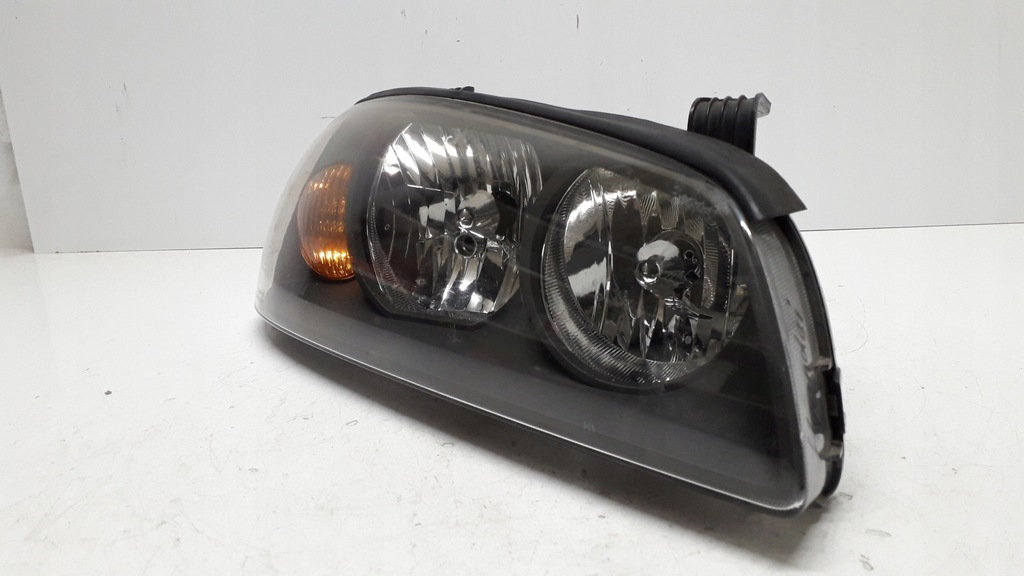 фото №11, Hyundai elantra 3 iii lift 03-лампа права передня