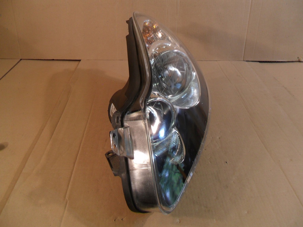 фото №8, Opel corsa d лампа ліва фара лівий 13217453