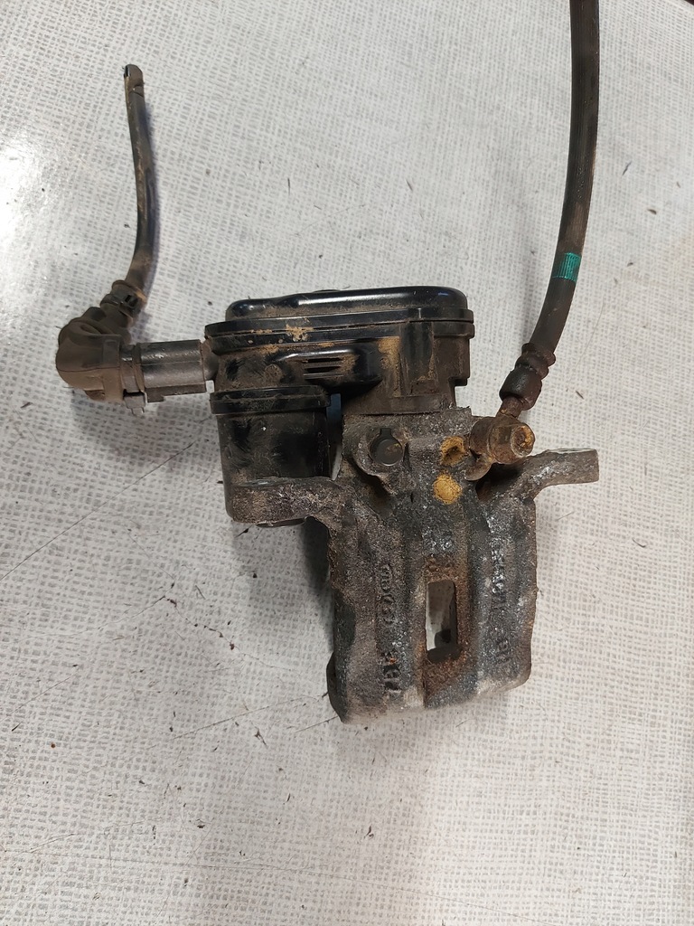 фото №1, Kia ceed ii суппорт тормозной задняя электрический левый a5582-37700