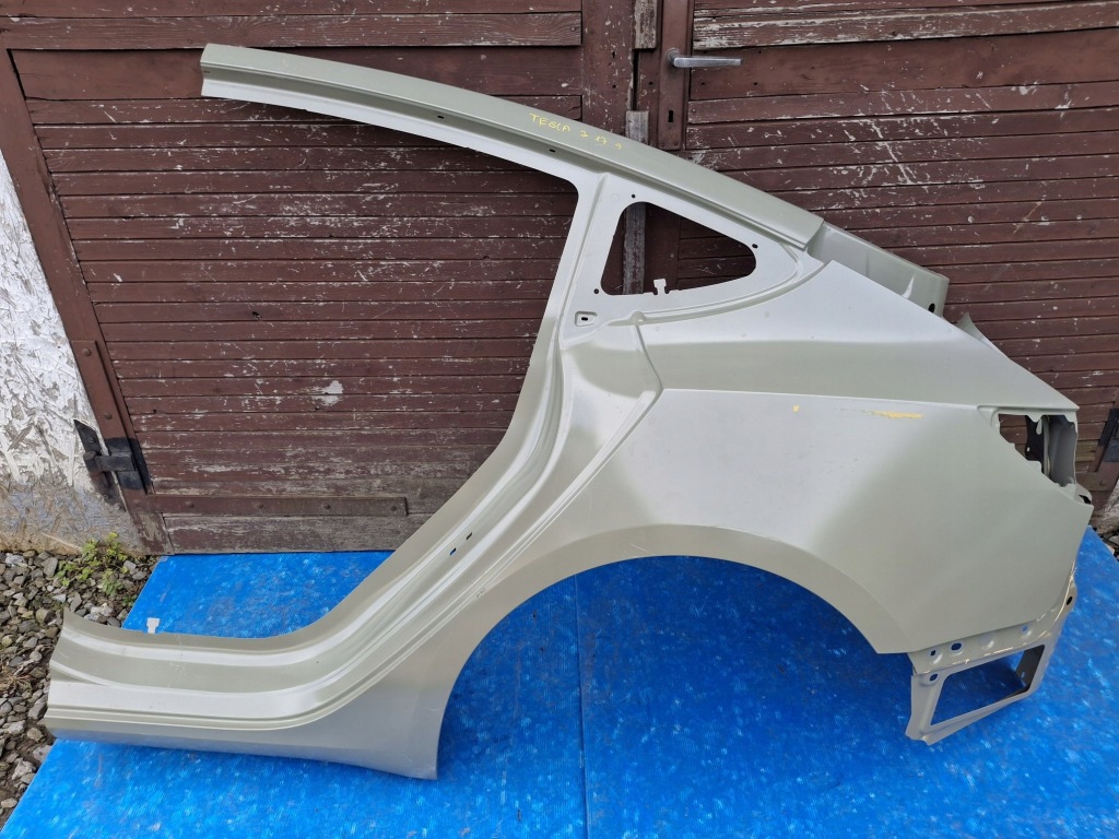 фото №1, Tesla model 3 обшивка крила лівий задня 1714353-00-b оригінал