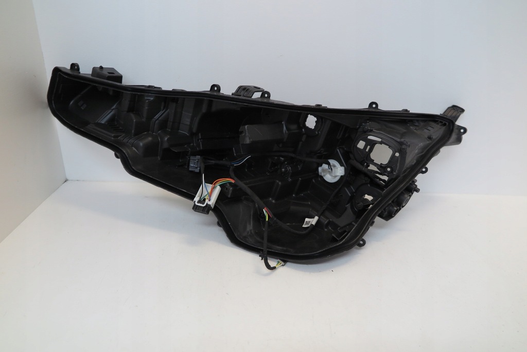 фото №1, Toyota corolla e21 hb kombi ліва лампа перед корпус корпус