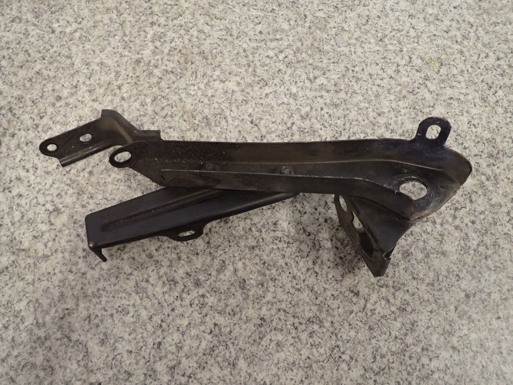 фото №1, Toyota corolla verso 2.2d 04- кронштейн замка капот