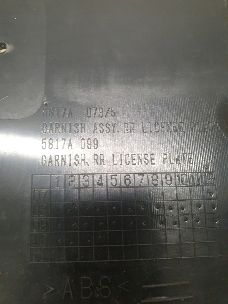 фото №10, Mitsubishi lancer x подставка номерного знака накладка 5817a099