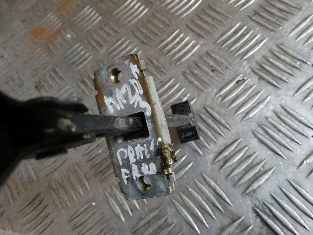 фото №5, Обмежувач двері mazda 3 правий перед