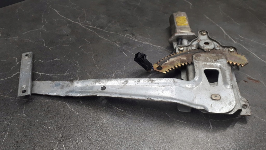 фото №8, Механізм скло лівий задня nissan sunny y10