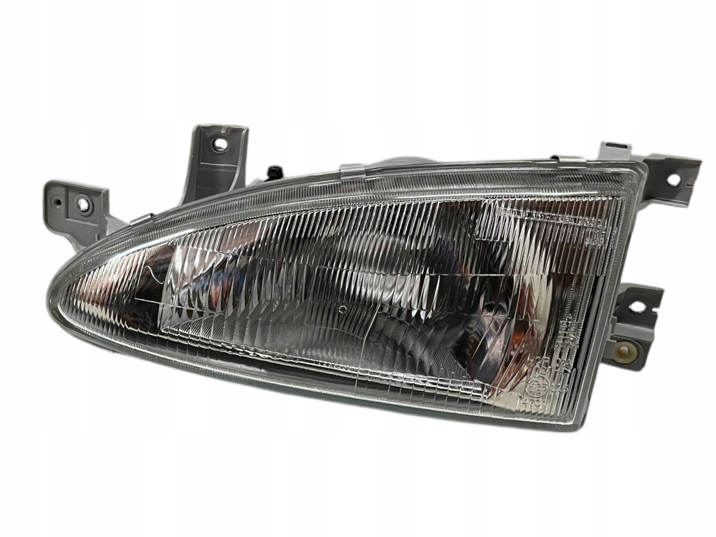 фото №1, Лампа фара главный левый hyundai accent 3d 1994- оригинальный номер 9210122200