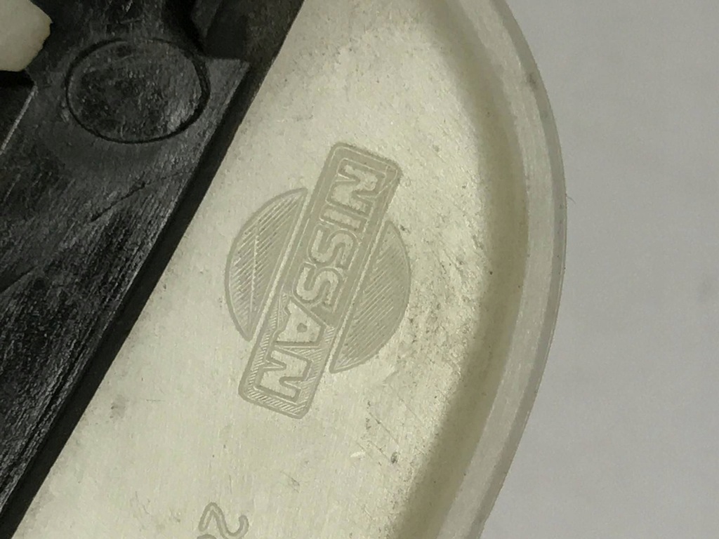 фото №6, Nissan micra k14 левая заглушка распылителя лампы передней 28659