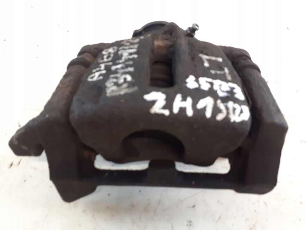 фото №1, Audi a4 b8 супорт гальмівний лівий задня