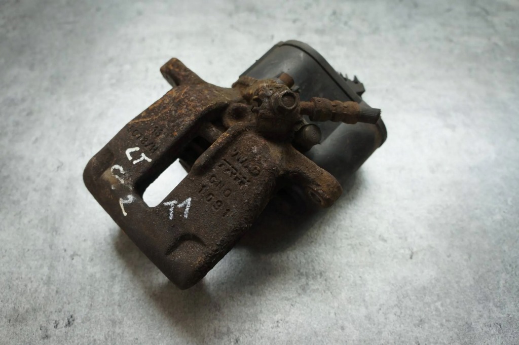 фото №1, Суппорт тормозной моторчик левый задняя vw passat cc