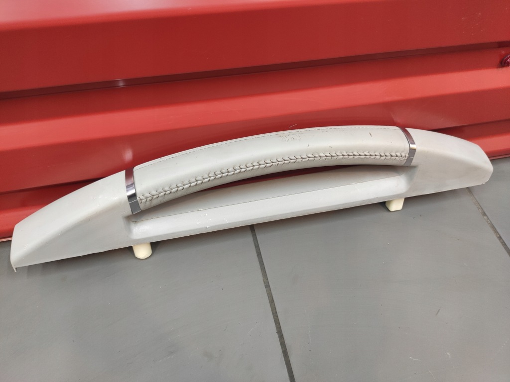фото №1, Jeep cherokee liberty kk 07-12r. кронштейн ручка консолі сіра шкіра оригінал