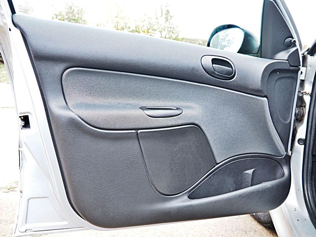 фото №1, Peugeot 206 lift оббивка обшивка двері лівий перед