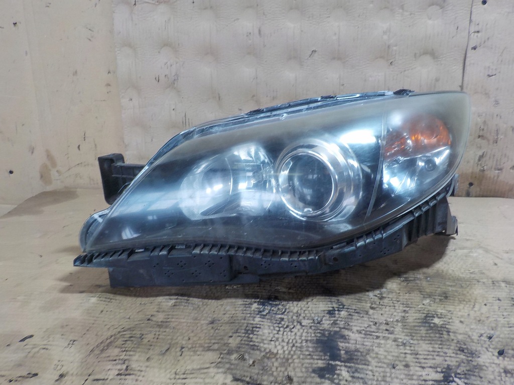 фото №8, Impreza iii лампа лівий перед 2559000102 pęknięte 1 кронштейн