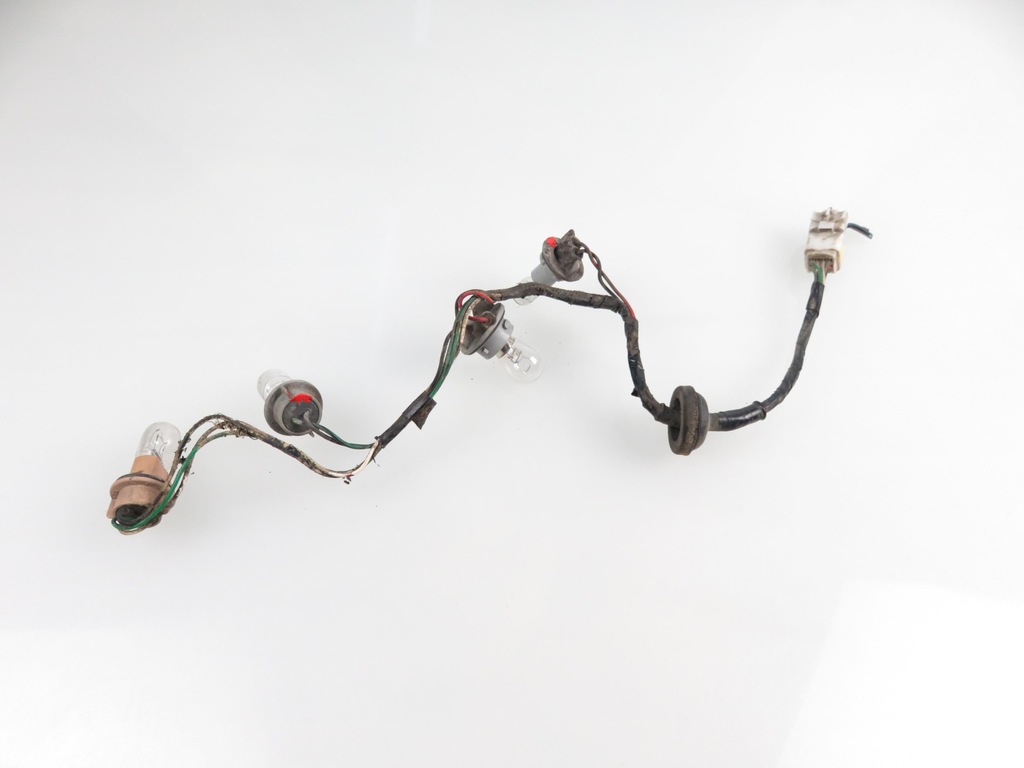 фото №1, Вкладиш лампи лівий задня mazda premacy cp