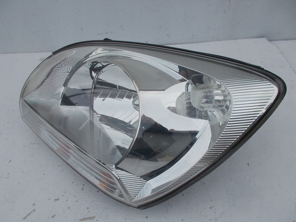 фото №7, Фара лампа kia sportage ii 2 europa левая