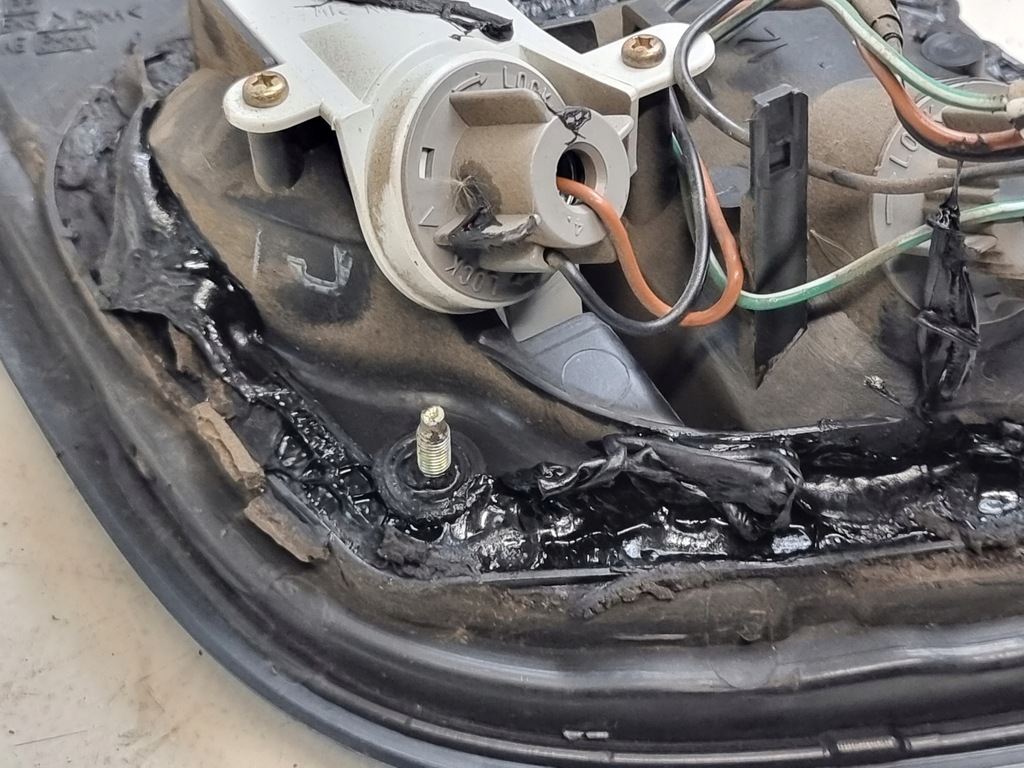 фото №10, Лампа задняя левая w крышка lift 3d оригинальный номер ba75eb18 nissan almera n15