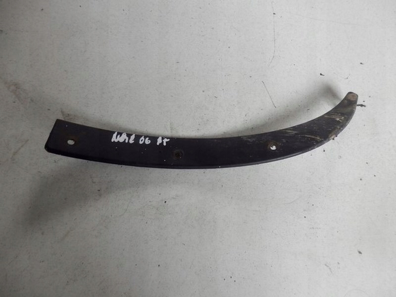 фото №1, Nissan note 06 кронштейн молдинг підкрилок правий задня