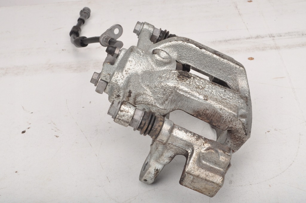 фото №6, Ford puma ii mk2 1.0 супорт гальмівний лівий перед