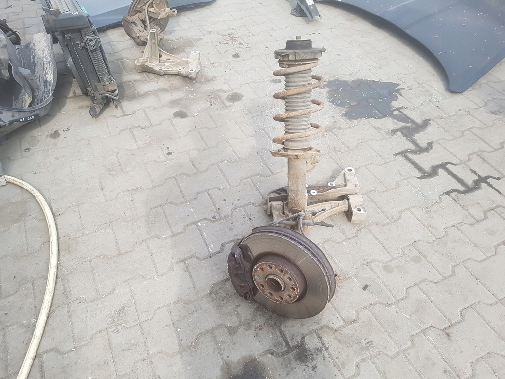 фото №1, Vw eos 06-10r 2.0 tdi амортизатор поворотный кулак левая