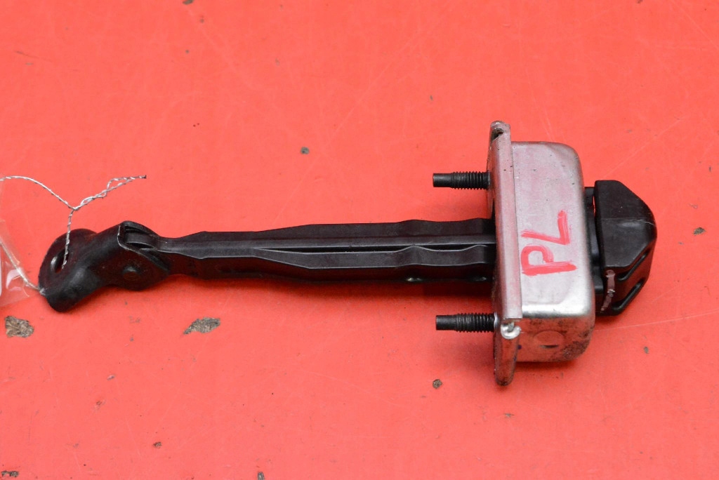 Обмежувач двері лівий перед 39089087 opel insignia b sedan 17-20 в Україні