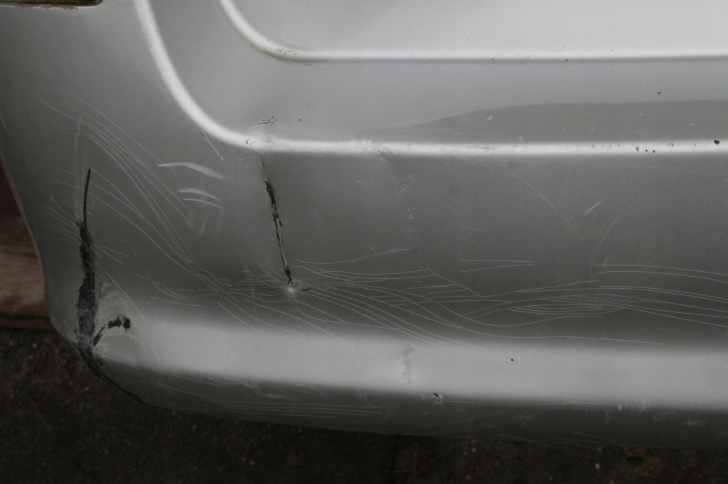 Купити Бампер задній opel astra h kombi