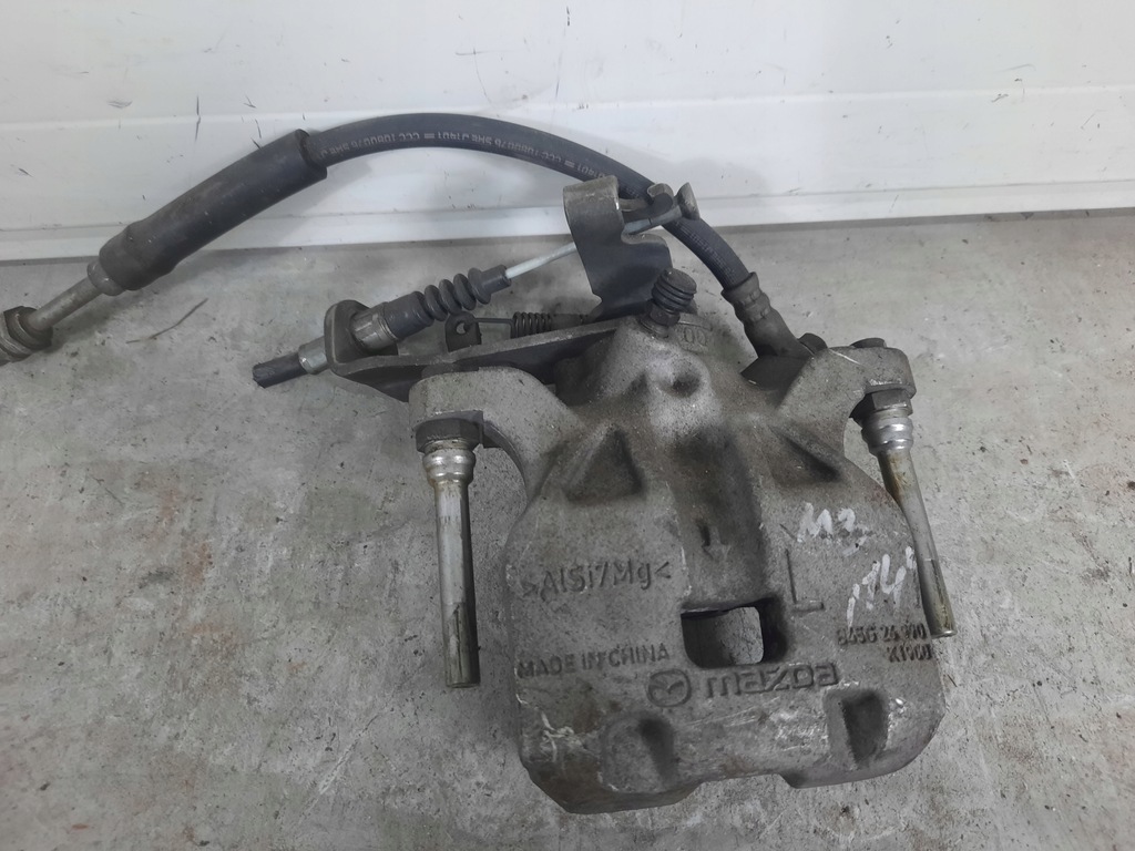 фото №1, Супорт задня задній лівий mazda 3 iii bm 13-18