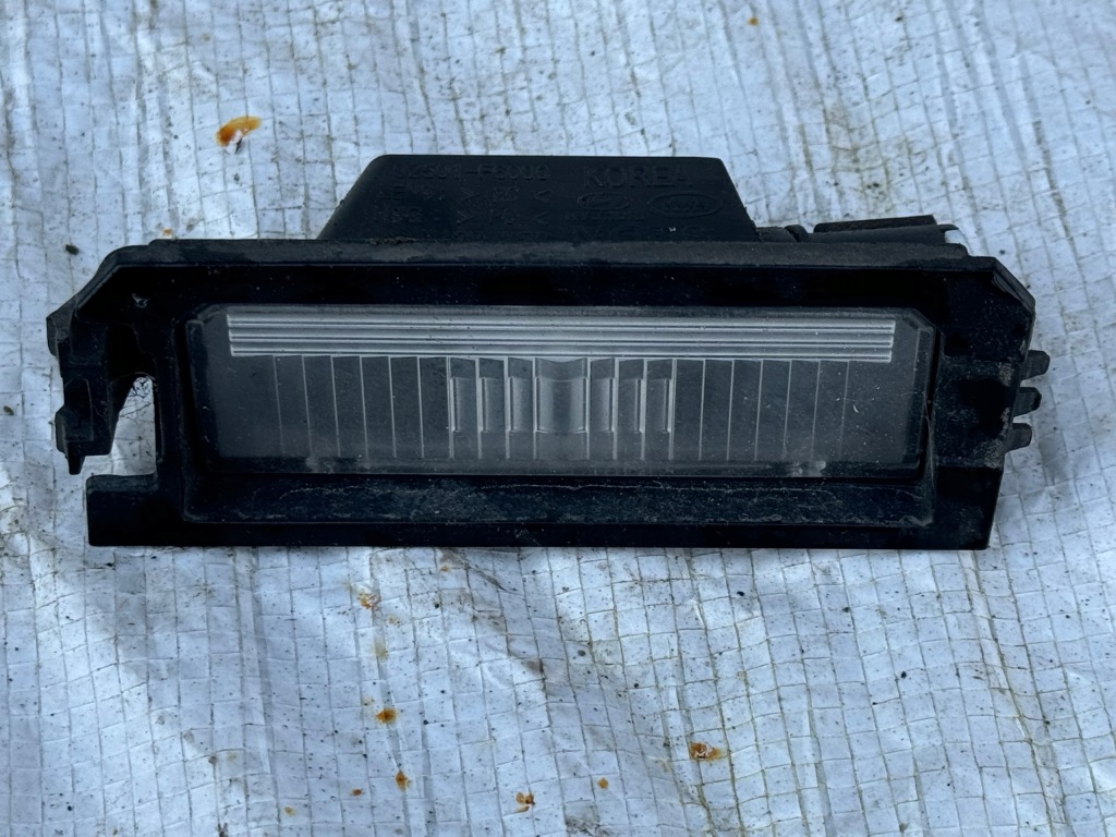 фото №1, Kia rio iv лампа освещение номерного знака 92501-f6000