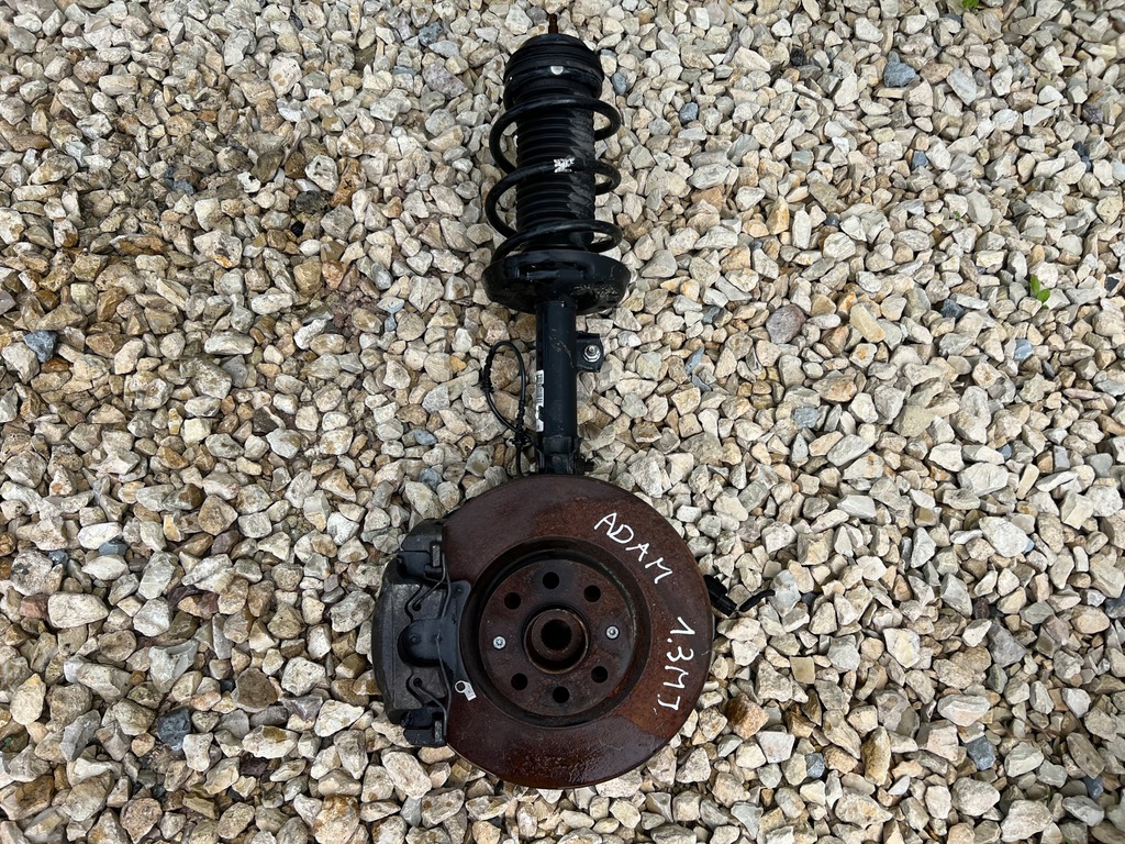 фото №1, Opel corsa e adam поворотний кулак амортизатор лівий 1.3d