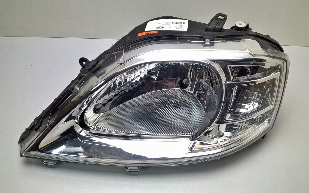 фото №1, Dacia logan lift 2008-2013 лампа фара правий оригінальний номер eu 8200744753