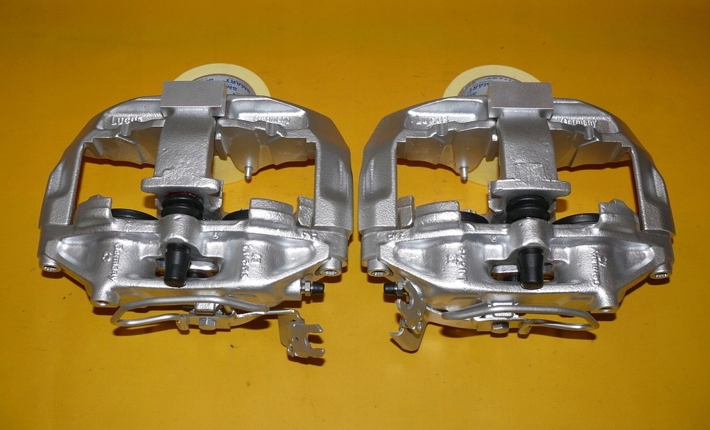 фото №9, Супорти гальмівні скоба лівий правий перед audi a8 d2 s8 323/30mm 94-98r.