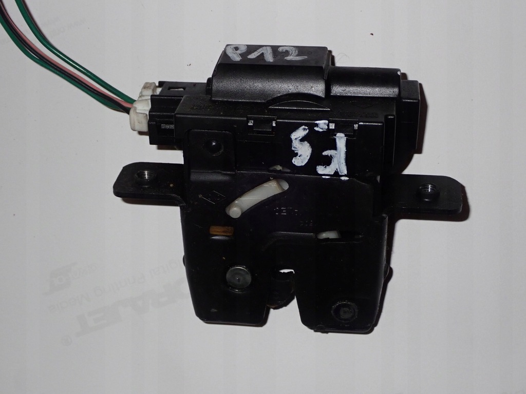 фото №1, Nissan primera p12 замок крышки задний hb 5d