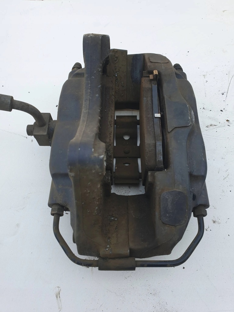 фото №2, Tesla s суппорт тормозной левый задняя