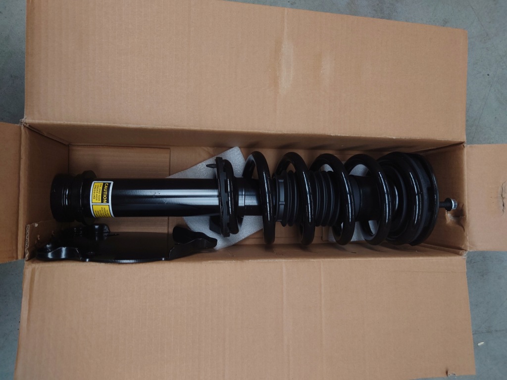 Купить Tesla амортизатор перед awd 1030607-01-d новый