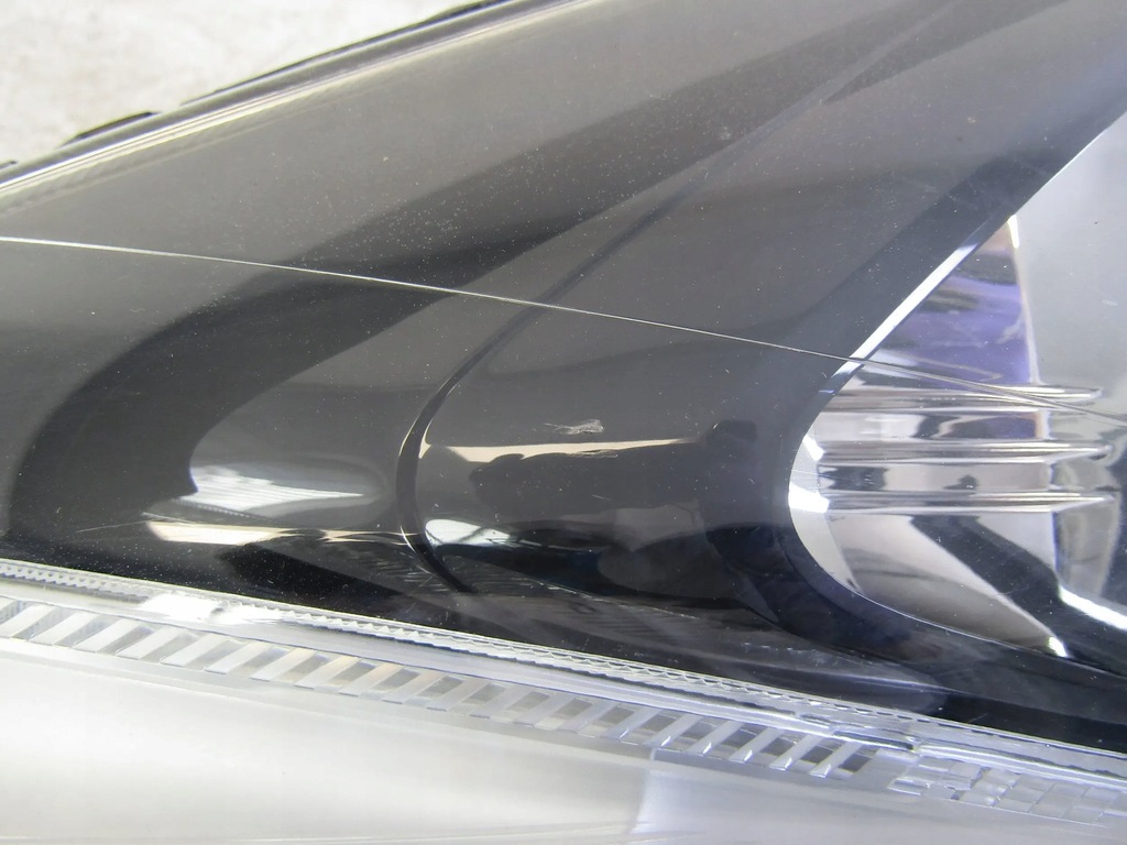 фото №10, Mazda 2 лампа права перед 07-14r