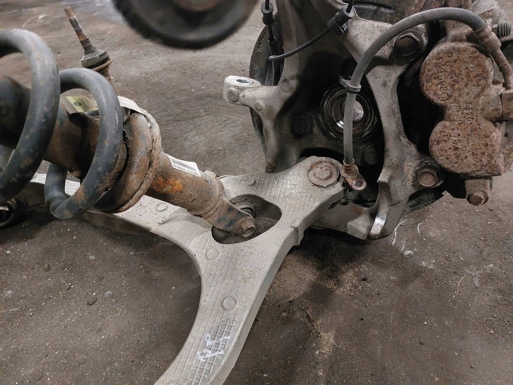 фото №7, Поворотний кулак амортизатори важелі гальмівні диски супорти перед ram 1500 i 5.7 13-