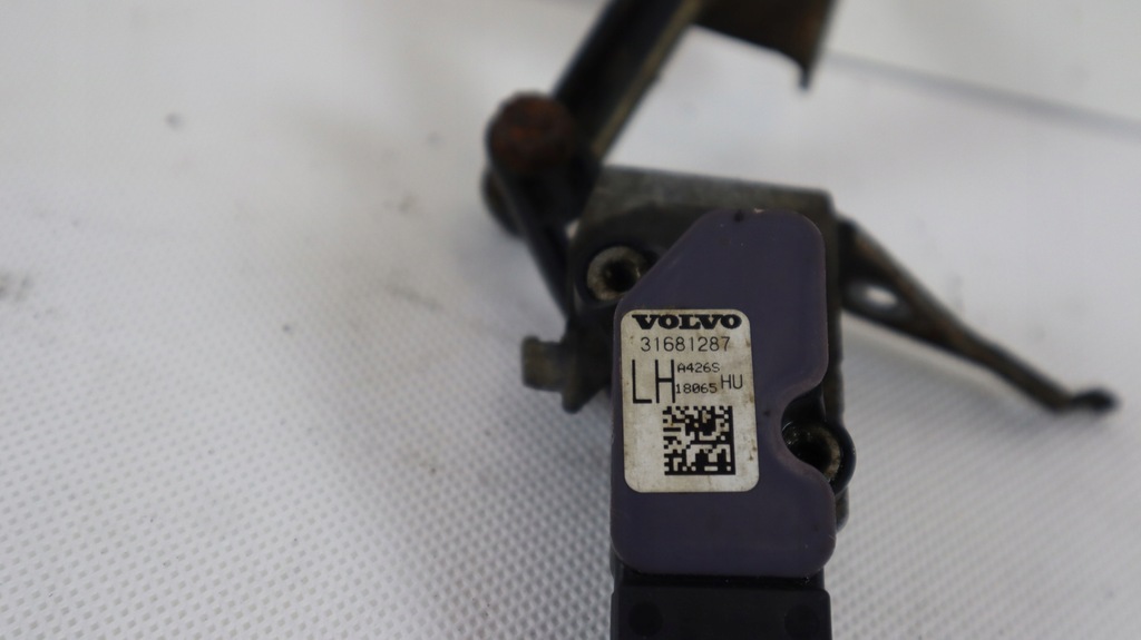 фото №6, Volvo v90 датчик вирівнювання світла лівий 31681287