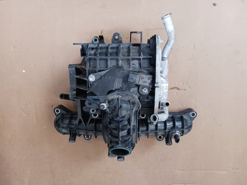Купити Колектор впускний  mazda 3 bp 1.8 s550-13565-a