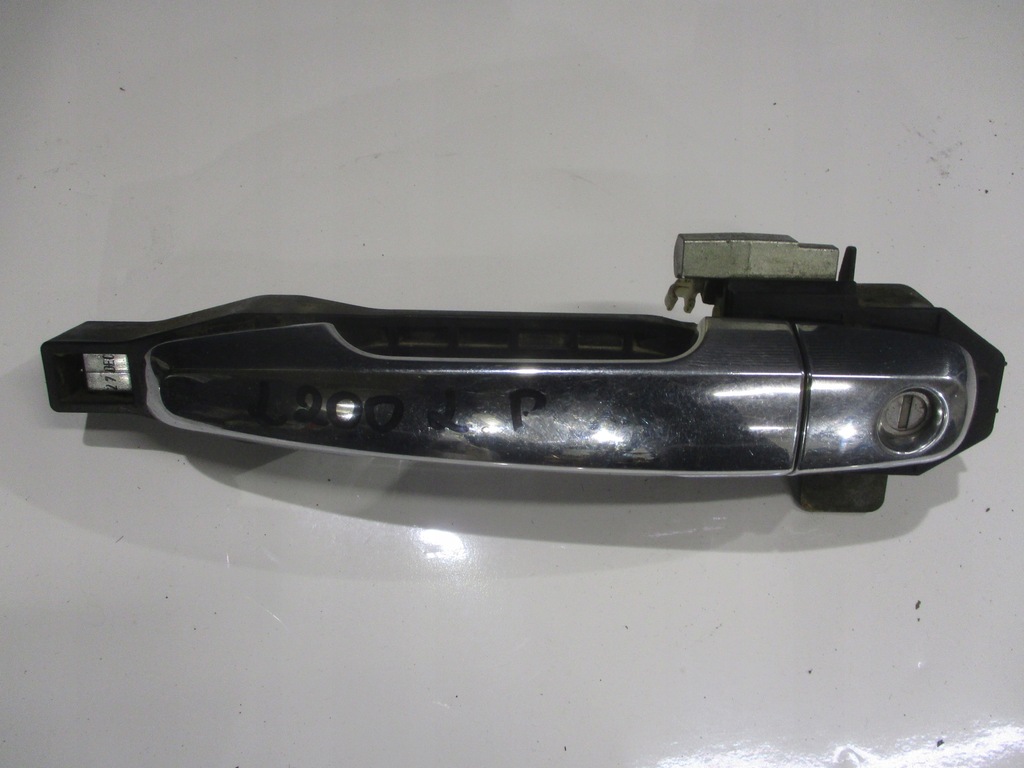 фото №1, Ручка дверь наружная левый перед l200 iv 06- хром