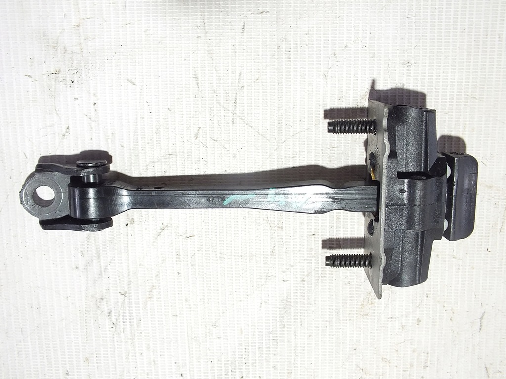 фото №1, Peugeot 301 ограничитель дверь левый задняя