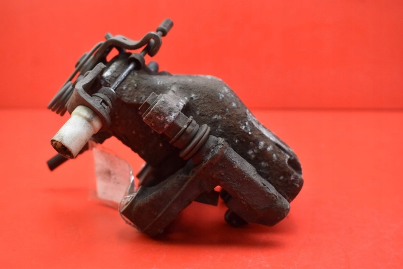 фото №4, Суппорт тормозной правый задняя peugeot 208 1 i 1.4 vti