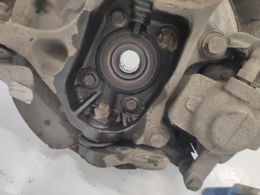 фото №3, Mini r56 lift поворотний кулак лівий перед 1.6d