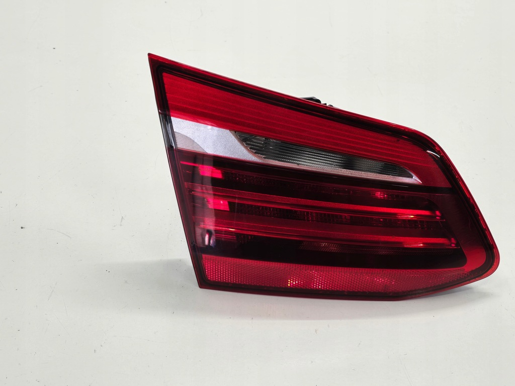 фото №1, Bmw 2 f45 15r лампа лівий задня w кришка 7311031