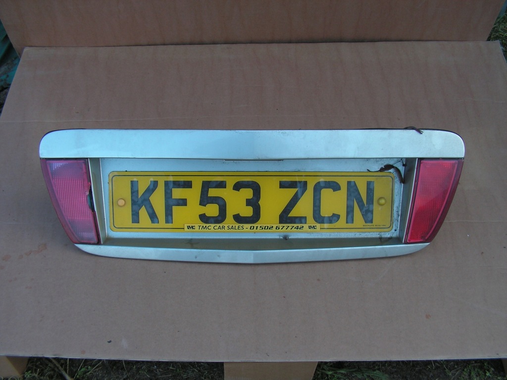 фото №1, Молдинг кришки pod номерний знак nissan primera