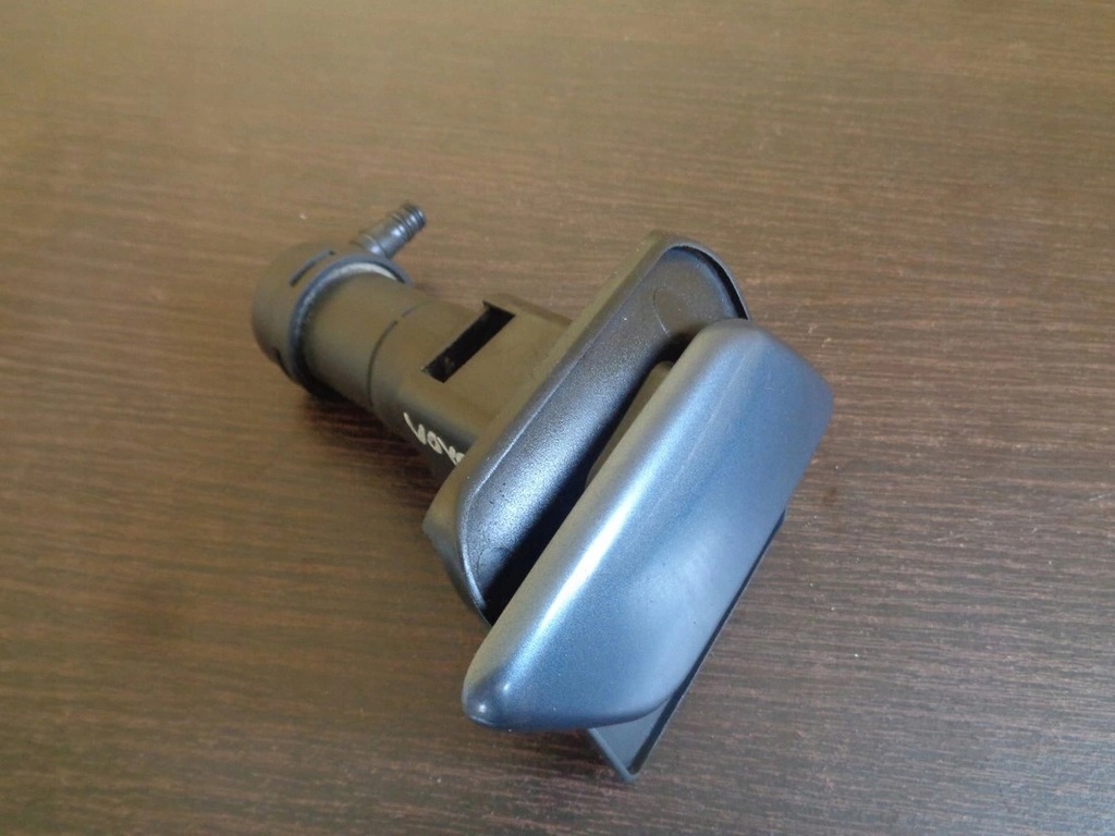 фото №1, Омыватель заглушка лампы правой voyager 01-04 r