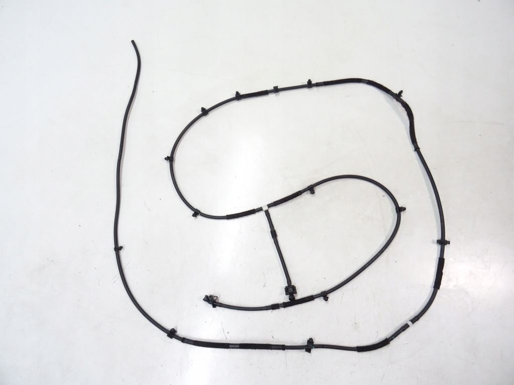 фото №1, Volvo ex30 ex-30 шланг wąż омивача фари лампа перед