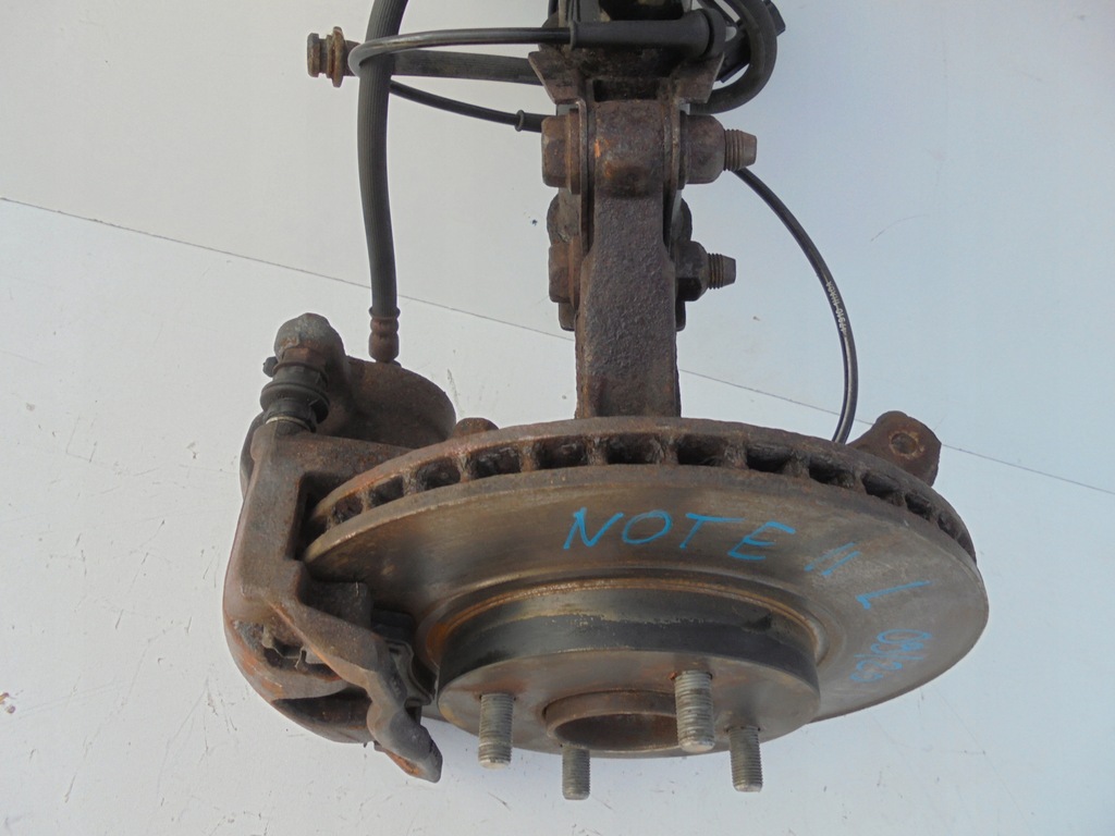 фото №5, Nissan note ii e12 амортизаторна стійка поворотний кулак ліва