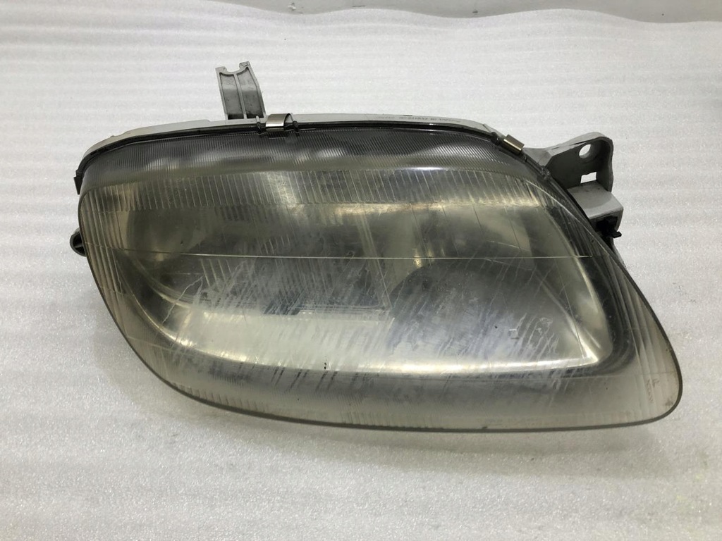 фото №1, Halolgen лампа правий перед mazda 323f